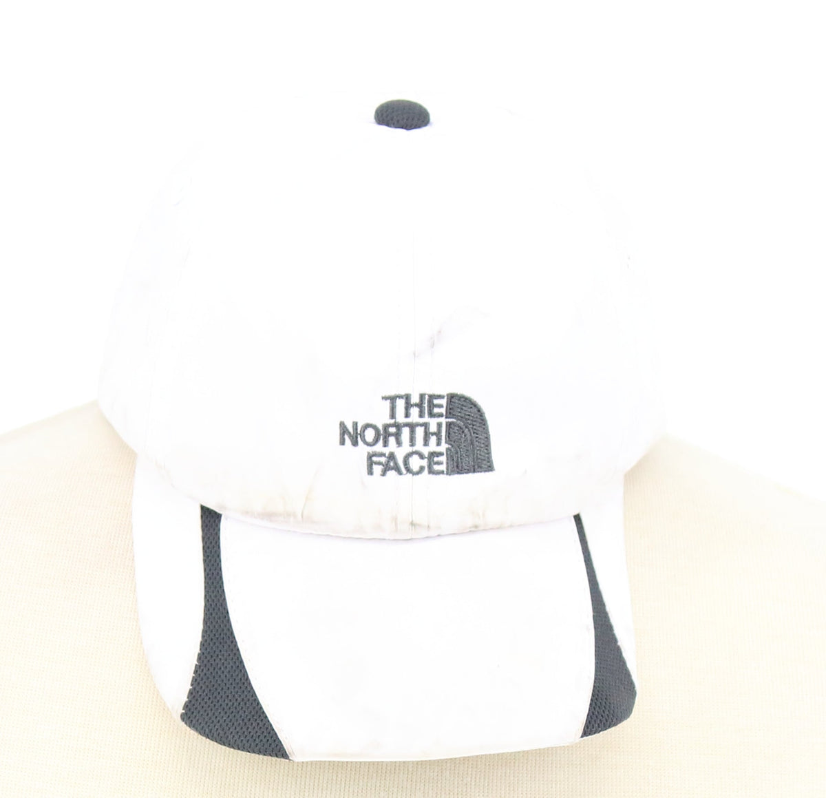 The North Face White Cap With Grey Embroided Logo At Front