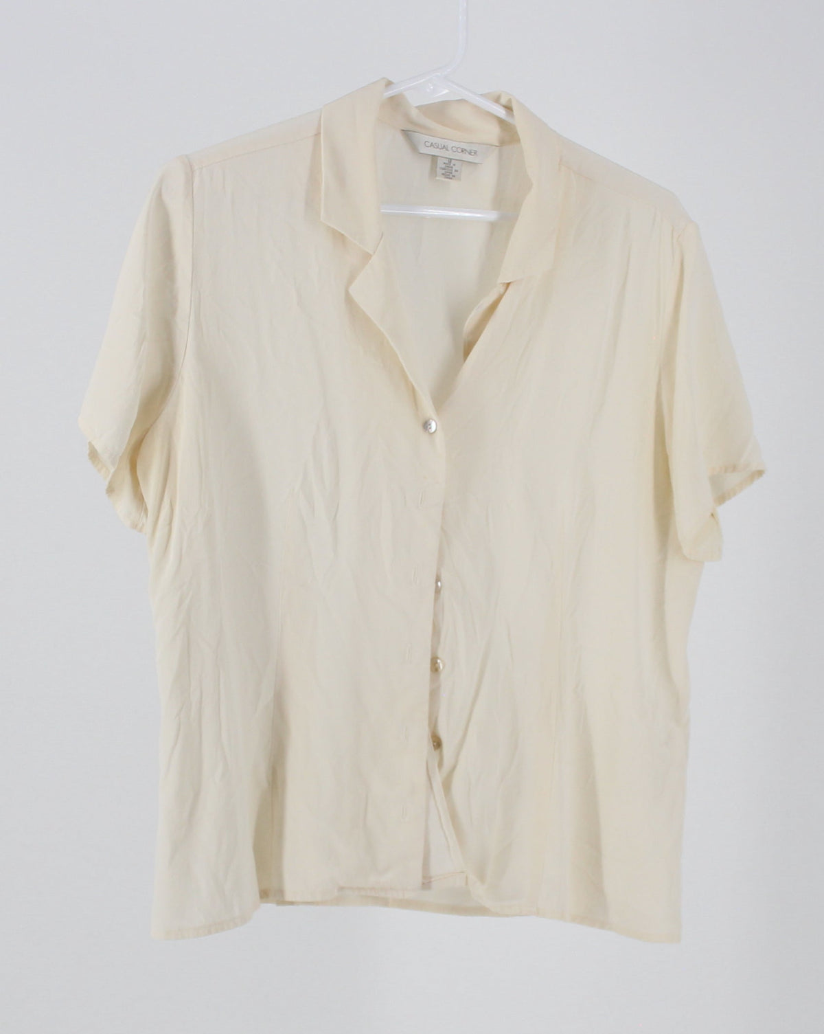 Casual Corner 100% Silk cream short sleeve button up shirt